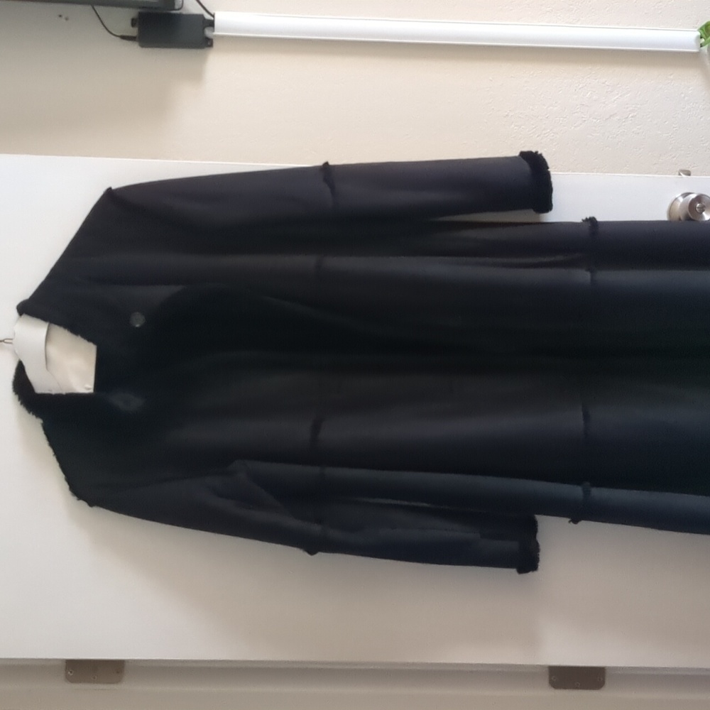 Long black winter jacket.